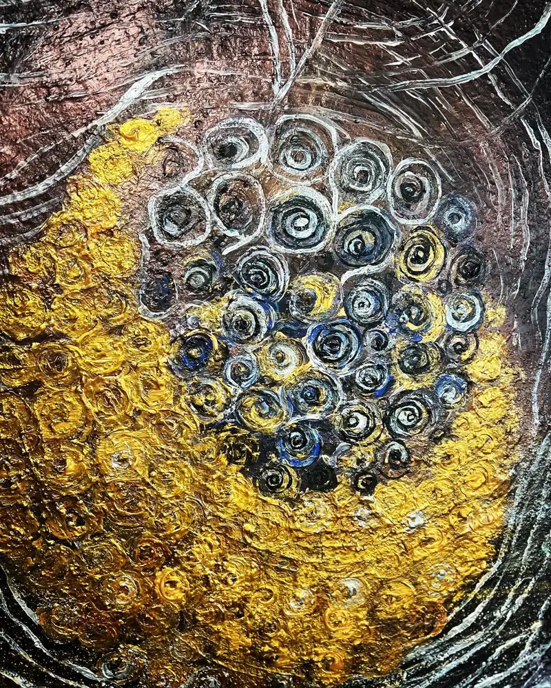 Artwork by Inga Zollinger: gold and silver spirals emerging from darkness